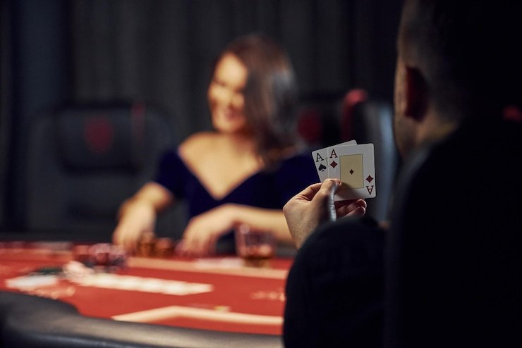 Live casino studio with multiple dealer stations and gaming interface